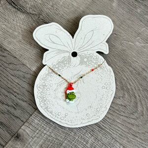 American Eagle Grinch Necklace